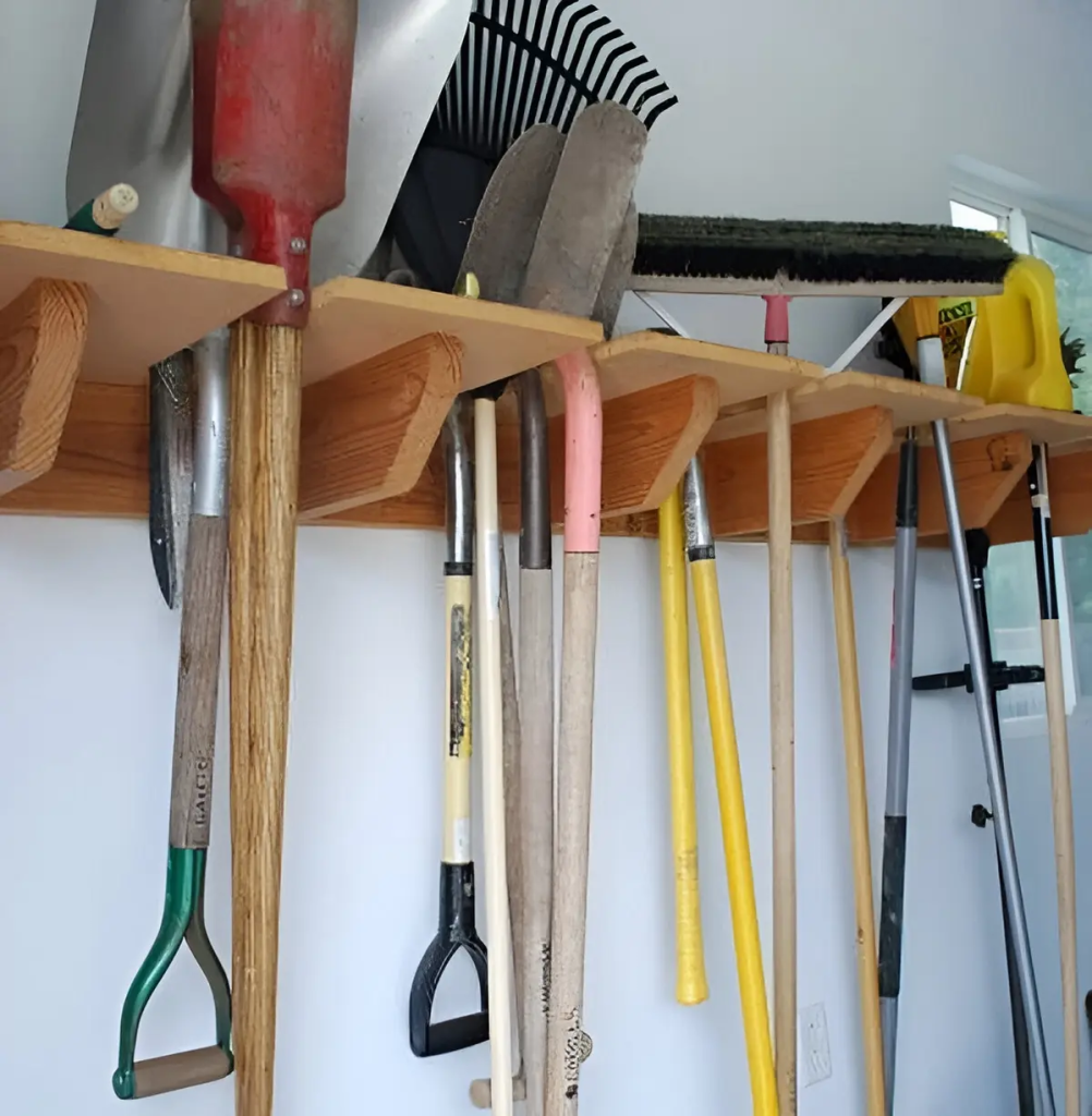 A tool rack made from wood storing long tools.