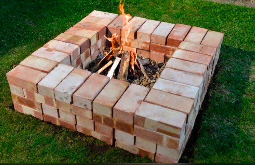 Old bricks being used to create a fire pit.