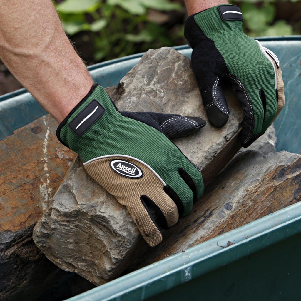 Ansell gardening gloves being used for landscaping.