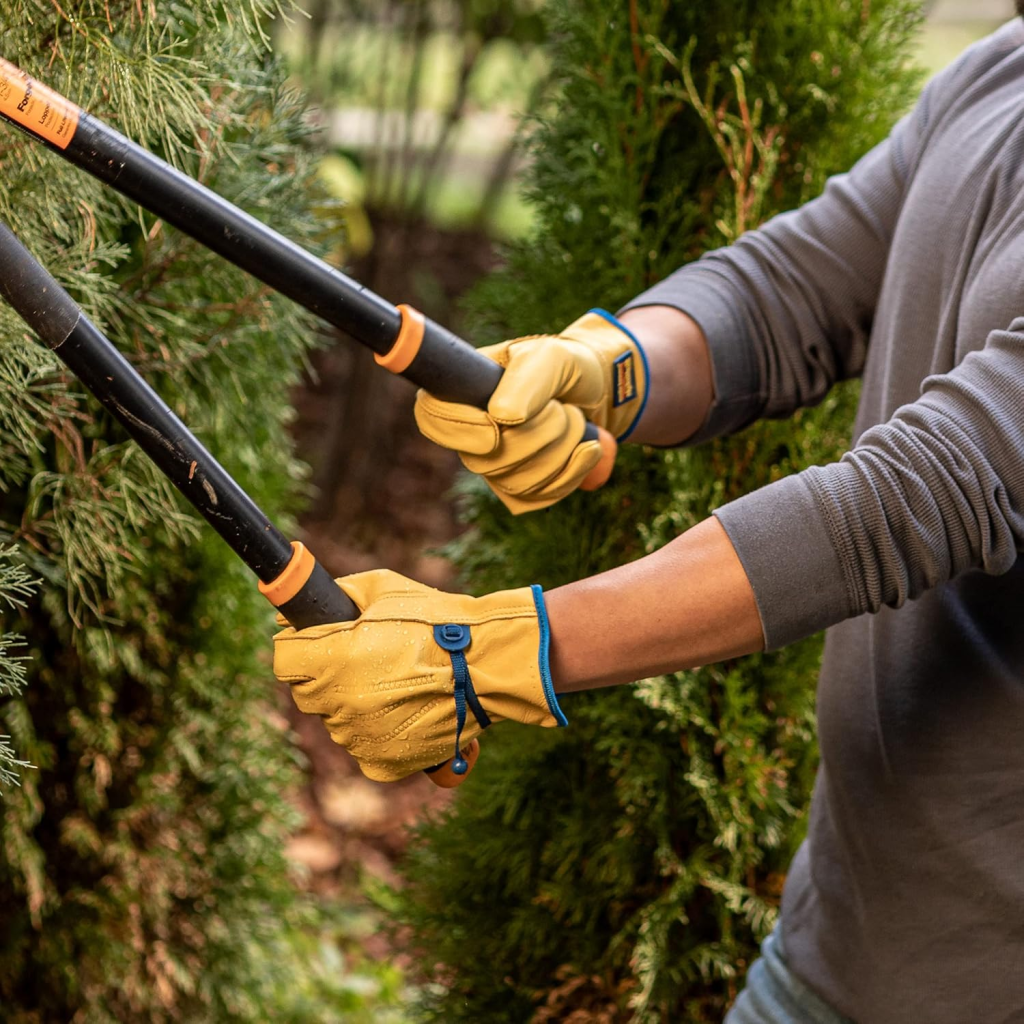 Wells Lamont gloves being used with trimmers.