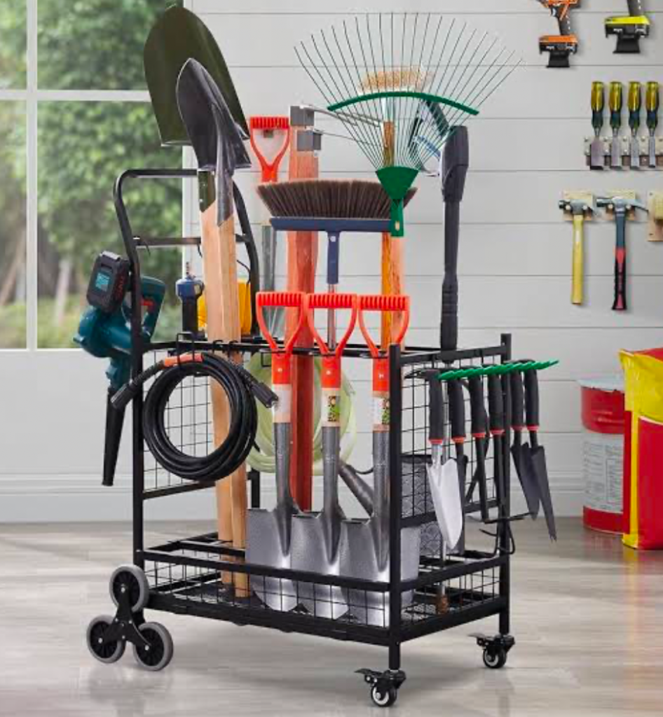 A tool cart organizers in a garage packed with various tools.