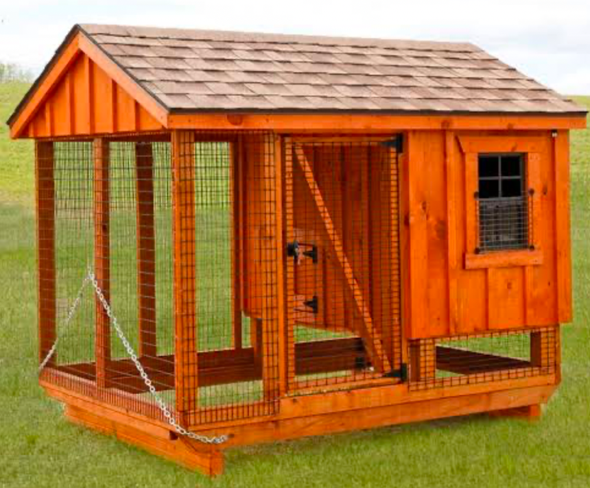 Portable wooden chicken coop with enclosed run.